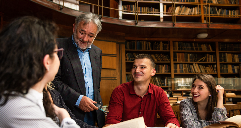 Students studying together in a library
